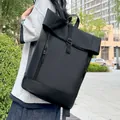 Minimalist black roll-top waterproof laptop backpack for commuters with side pocket - Black