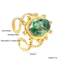 Gold plated stainless steel open ring featuring a large oval green turquoise stone - Vintage Green Spotted Stone Style (RI1457J1G)