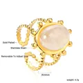 Adjustable gold plated stainless steel ring with a large oval white moonstone inlay - Oval White Stone Gold Bead Edge Style (RI1457A1G)