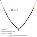 Detail view of Lapis Lazuli beaded necklace with 18K gold plated stainless steel pendant - Round Zircon Pendant (MSNK0226)