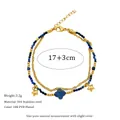 Detail of double-layer stainless steel bracelet with blue beads and gold star charms - Double Layer Twisted Chain Star Clover Style(MSB0154)