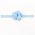 Dettaglio di una fascia per neonati celeste con decorazione floreale in tessuto 3D - Blu