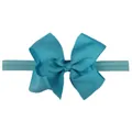 Detalle de diadema azul claro con lazo acanalado, textura y correa elástica - Azul