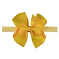 Primer plano de un lazo de cinta de grano grueso amarillo con diadema elástica para bebés - Amarillo