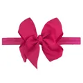 Close-up of a rose red grosgrain ribbon bow headband with elastic seamless band - Rose Red
