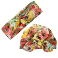 Dettaglio del set cappello a turbante e fascia per neonati con stampa floreale colorata - Giallo Floreale