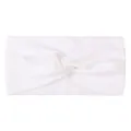 Detail of soft white nylon twist knot headband for babies with high-quality fabric texture - White