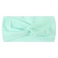 Detail of light mint green knitted nylon hair band with a soft twist knot texture - Mint Green
