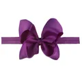 Elastic baby headband with a deep purple grosgrain bow, solid color and soft texture - Dark Purple