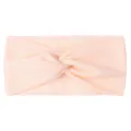 Detail of soft pale orange nylon twisted knot headband for baby girls with fabric texture - Nude Pink