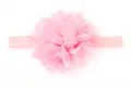Dettaglio della fascia per neonati con fiore in chiffon rosa e tessuto elastico - Rosa