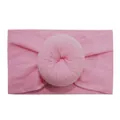 Soft pink nylon wide headband for infants featuring a donut-shaped pleated ball accent - Medium Pink