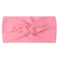 Close-up of bright pink nylon twisted knot headband with soft breathable texture - Pink