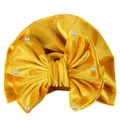 Yellow velvet baby turban hat featuring a large bow decorated with white pearls - Yellow