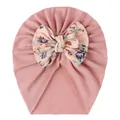 Rosa Baby Turban Mütze mit großer geblümter Schleife und elastischer Strickstruktur - Hautpuder Schneeknospe