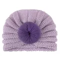 Soft light purple knit baby beanie hat with a dark purple doughnut knot on plain background - Purple