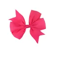 Macro detail of magenta grosgrain ribbon hair bow showing multi-layer fold and fabric texture - Rose Red