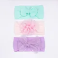 Set of 3 nylon baby headbands with floral and bow accents in pastel colors - Mint Green Light Pink Purple