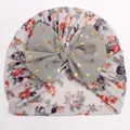 Detail of baby floral turban hat with light grey rose print and large mesh gold dot bow - Gray
