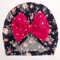 Dettaglio turbante neonata a fiori con fiocco in chiffon fucsia e pois dorati - Blu Navy + Rosso Rosa