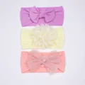Lot de trois bandeaux pour bébé en nylon avec nœuds violet, jaune et rose - Violet Beige Rose