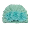 Detailed knit texture and layered flower ornaments on a mint green baby winter hat - Mint Green