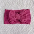 Deep pink double-layered bow headband for babies with a stylish ribbed knit texture - Deep Purple
