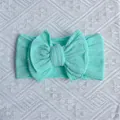 Mint green nylon baby headband with large double-layered bow and ribbed knit texture - Mint Green