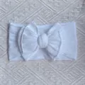 White nylon baby headband with a double-layered bow and cable knit texture - White