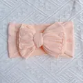 Light coral pink nylon baby headband with layered cable knit bow decoration - Nude Pink