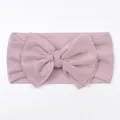 Detail of baby soft mesh headband with large double bow in dusty rose pink color - Taro Purple
