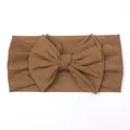 Detail of baby wide bow headband in brown mesh fabric with soft elastic texture - Dark Coffee