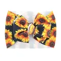 Detalle de diadema para bebé con lazo grande y estampado de girasoles en tela gofre - Negro