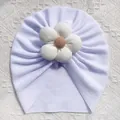 Dettaglio del turbante bianco per neonati con trama a maglia e grande fiore 3D centrale - Bianco