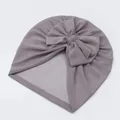 Detailed texture of breathable mesh baby turban with a large soft decorative bow - Gray