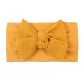 Elastic baby nylon headband with large mustard yellow waffle texture bow decoration - Khaki/Earth Yellow