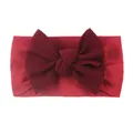Soft nylon baby headband with a large dark red waffle-knit bow on a white background - Burgundy
