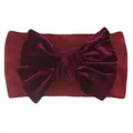 Detailed view of dark burgundy velvet baby headband with a large oversized bow knot - Burgundy