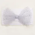 Dettaglio fascia neonata con fiocco in tulle glitter argento su fascia in nylon - Bianco