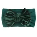 Detail of forest green velvet headband with a large bow showing soft fabric texture - Dark Grass Green