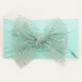 Dettaglio della fascia per neonata verde menta con un grande fiocco di paillettes - Verde Menta