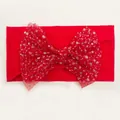 Detail of red baby headband featuring large mesh bow with sparkling silver sequins - Red