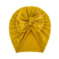 Details der senfgelben Baby-Stirnband mit goldenem Tüll-Schleife und Rippstrick - Erdgelb