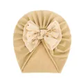 Detail of baby turban hat with delicate mesh bow and golden polka dot accents - Light Coffee