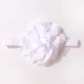 Dettaglio ravvicinato di una fascia per capelli con fiore bianco e banda elastica - Bianco