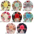 Detailed grid view of assorted baby turban hats with vibrant floral prints and mesh petals - 8-Color Mix