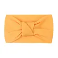 Close-up of bright orange nylon headband featuring a central knot and soft knit texture - Khaki/Earth Yellow