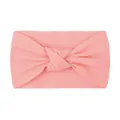 Detailed macro view of soft pink knotted nylon baby headband with wide ribbed fabric texture - Pink