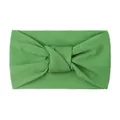 Close-up of grass green knotted nylon baby headband with soft knitted texture - Green
