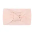 Detail view of baby knot headband in soft light pink nylon with a wide-brim design - Light Pink
